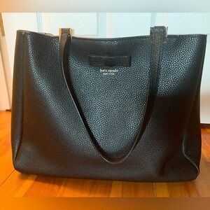 Kate Spade black leather tote with pink suede lining.